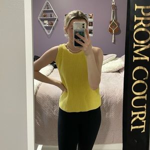 Yellow sweater in great condition, perfect for layering.